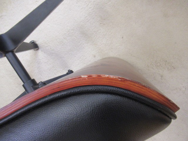 AFTER CHARLES AND RAY EAMES - A MODEL 671 OTTOMAN, modern, in Santos Palisander and black leather, Image