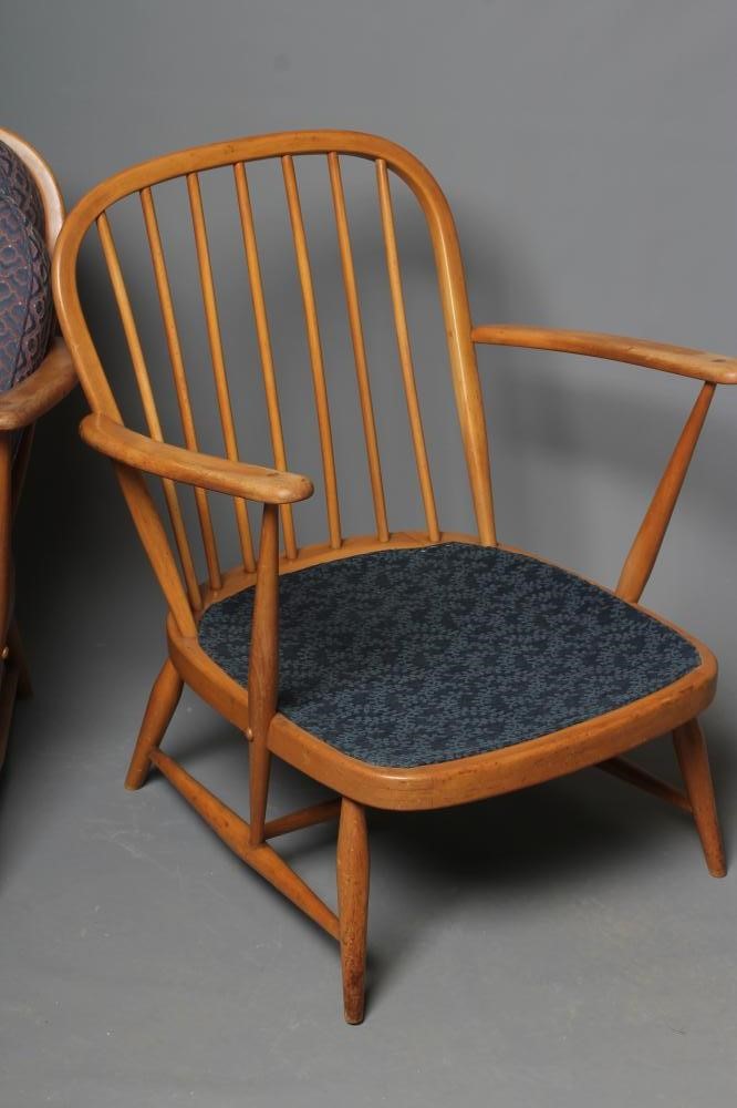 A PAIR OF ERCOL MODEL 355 WINDSOR ARMCHAIRS in beech and elm Image