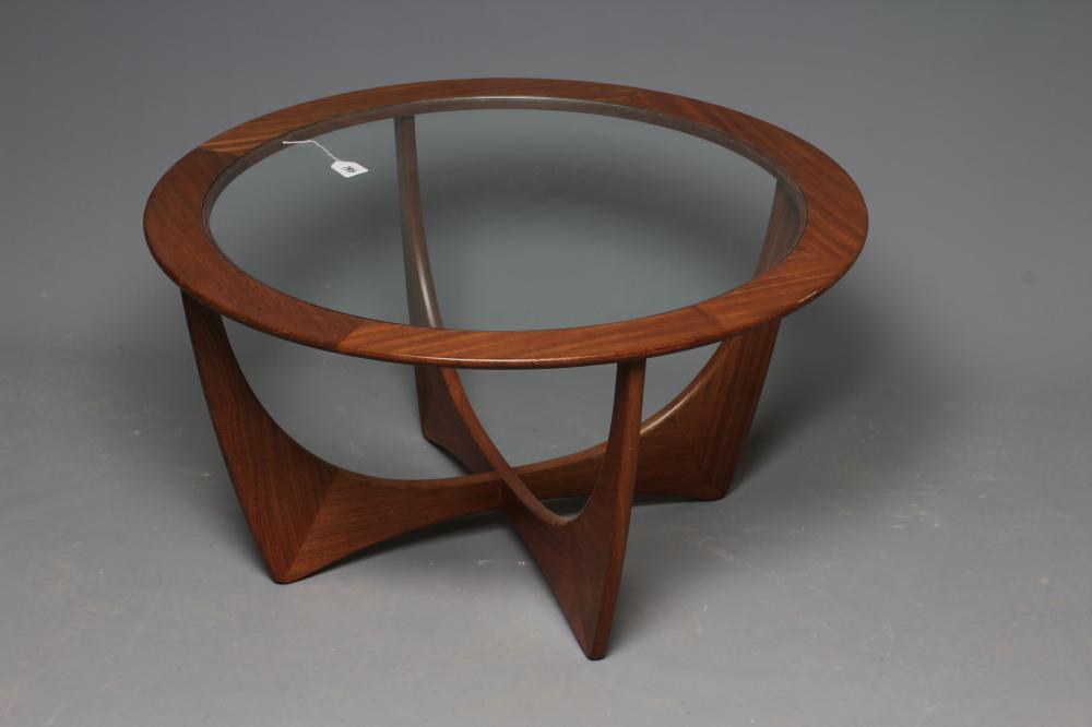V. B. WILKINS FOR GPLAN - A TEAK ASTRO COFFEE TABLE, the circular top with inset clear glass panel, Image