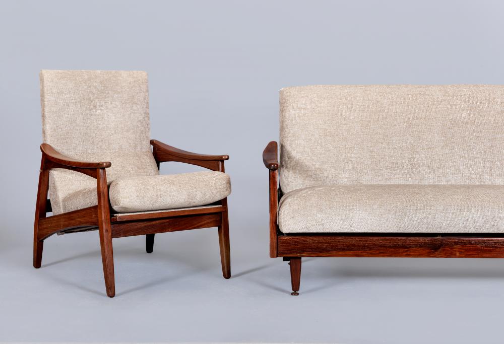 A RETRO TEAK FRAMED LOUNGE SUITE, c.1960's, upholstered in a pale mushroom chenille, comprising a Image