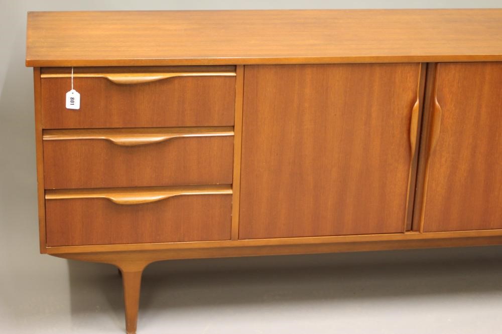 A MCINTOSH TEAK LONG SIDEBOARD Image