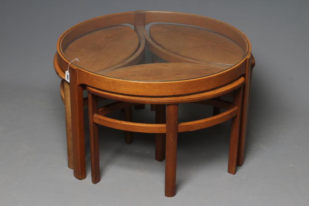 A NATHAN "TRINITY" TEAK NEST OF OCCASIONAL TABLES Image