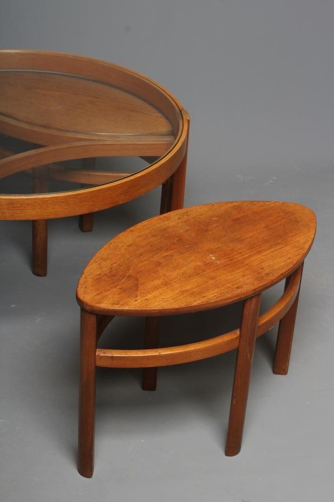 A NATHAN "TRINITY" TEAK NEST OF OCCASIONAL TABLES Image