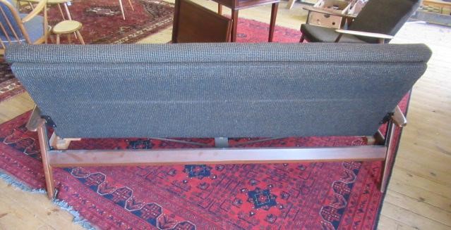 A FURPRO "TRAMPOLINE" TEAK FRAMED SOFA BED, mid 20th century, upholstered in a brown speckled Harris Image