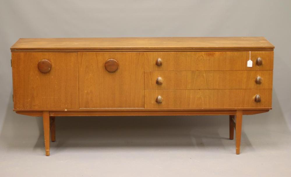A BEAUTILITY TEAK SIDEBOARD Image