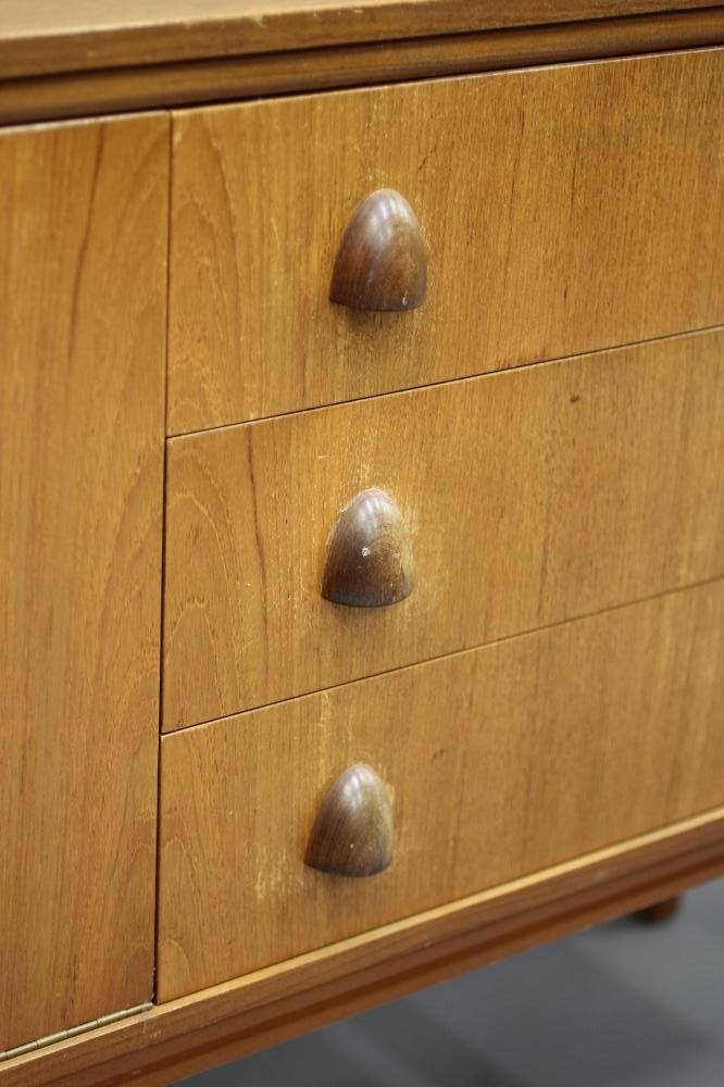 A BEAUTILITY TEAK SIDEBOARD Image