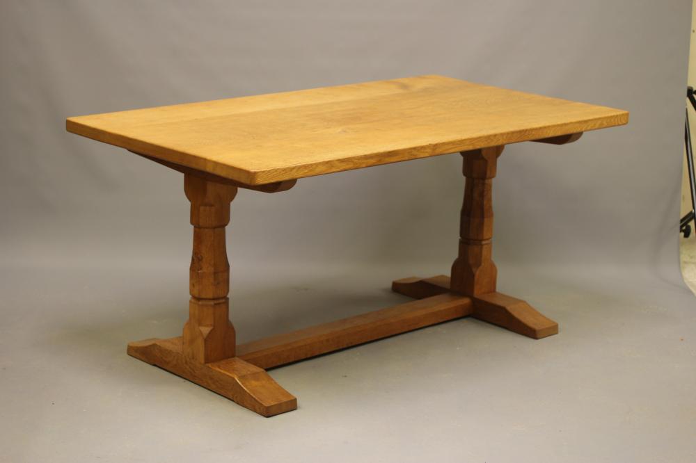 WILFRED HUTCHINSON (HUSTHWAITE) AN ADZED OAK DINING TABLE Image