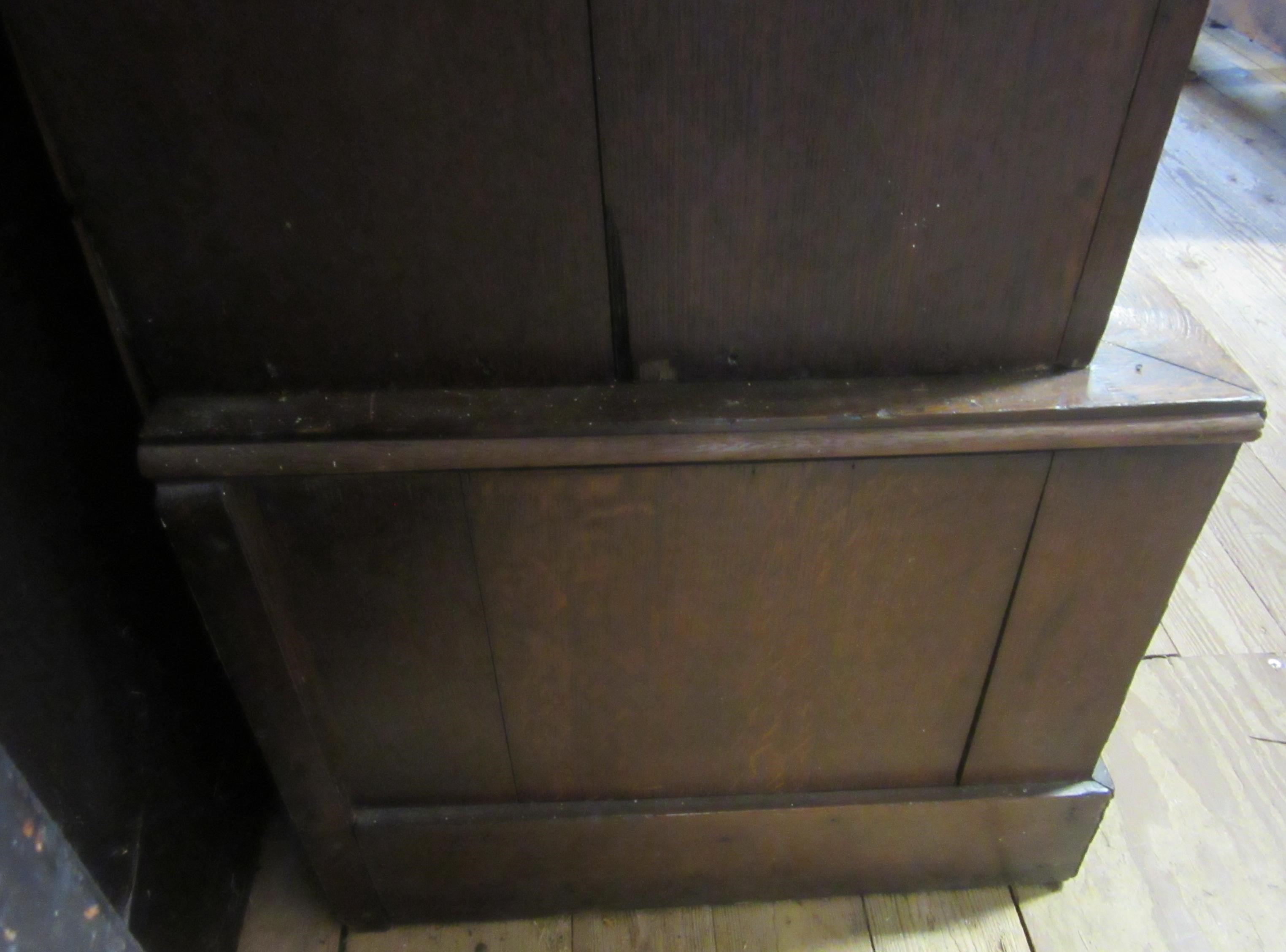 A LARGE GEORGIAN OAK ESTATE CUPBOARD Image