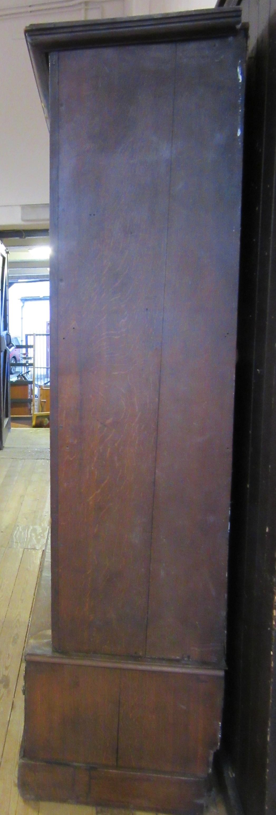 A LARGE GEORGIAN OAK ESTATE CUPBOARD Image