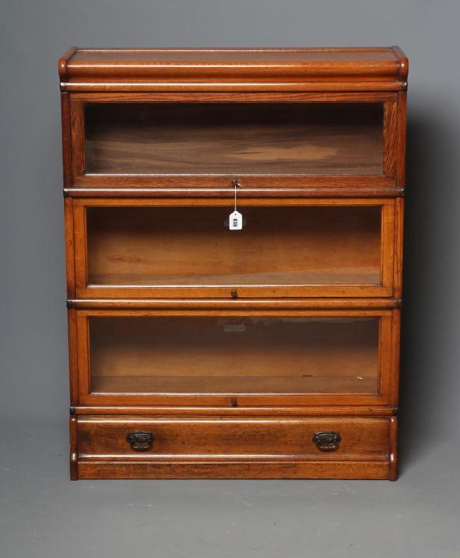 A VICTORIAN GOLDEN OAK GLOBE WERNICKE SECTIONAL BOOKCASE Image