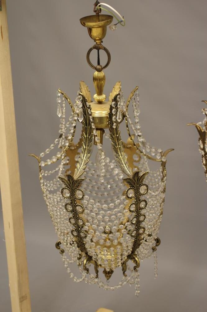 A GILT METAL CHANDELIER Image