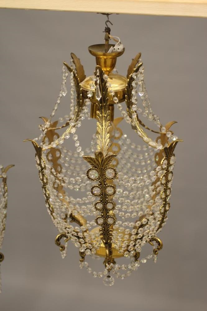 A GILT METAL CHANDELIER Image