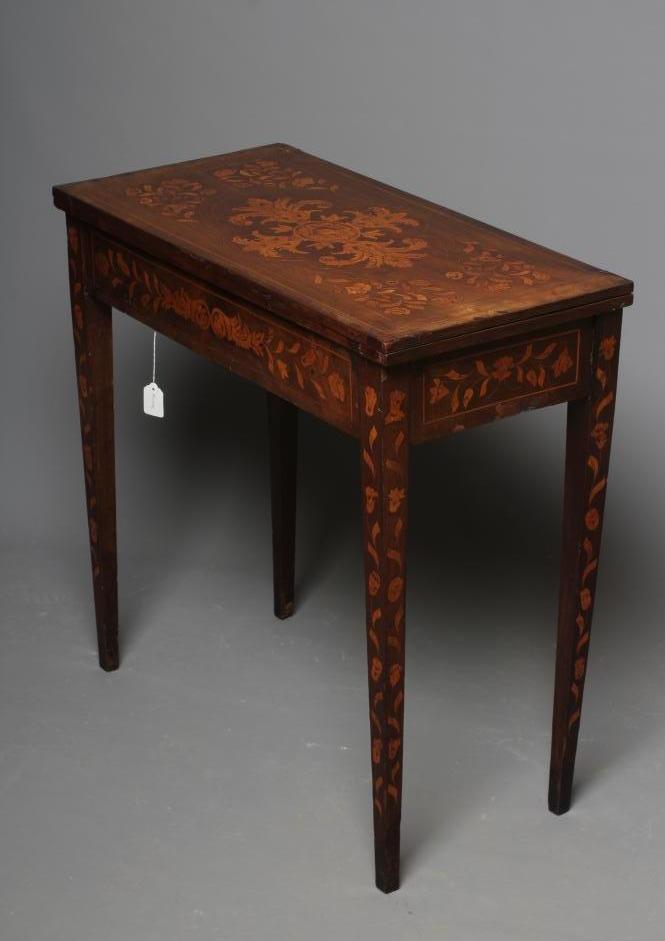 A DUTCH WALNUT AND MARQUETRY FOLDING CARD TABLE Image