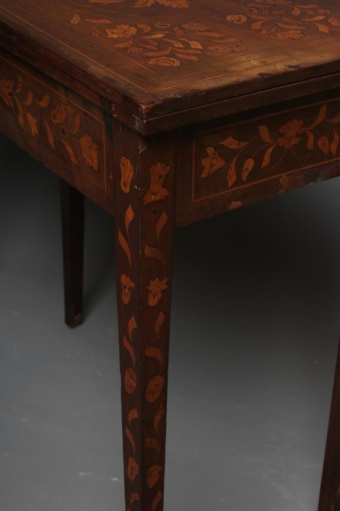 A DUTCH WALNUT AND MARQUETRY FOLDING CARD TABLE Image