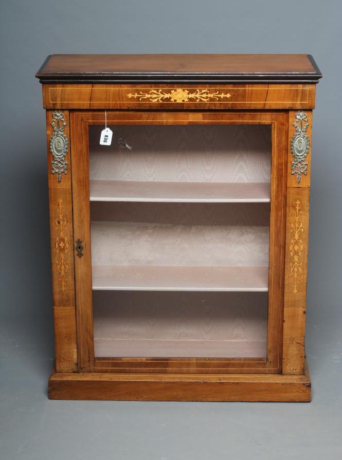 A VICTORIAN WALNUT AND EBONISED PIER DISPLAY CABINET Image