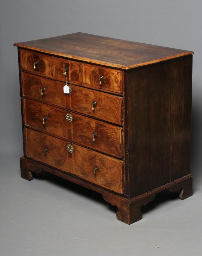A WALNUT AND BANDED STRAIGHT FRONT CHEST Image