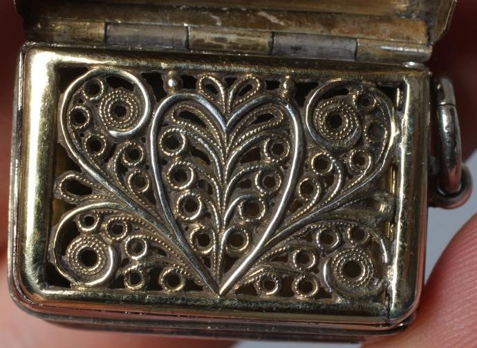 A GEORGE III SILVER HANGING VINAIGRETTE by Matthew Linwood, Birmingham 1802, of plain rounded oblong Image