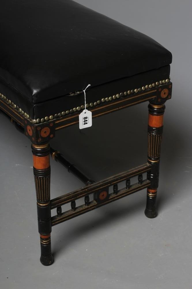 AN AESTHETIC EBONISED AND PARCEL GILT DUET STOOL Image