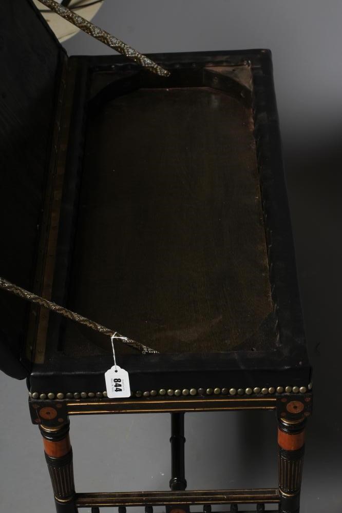 AN AESTHETIC EBONISED AND PARCEL GILT DUET STOOL Image