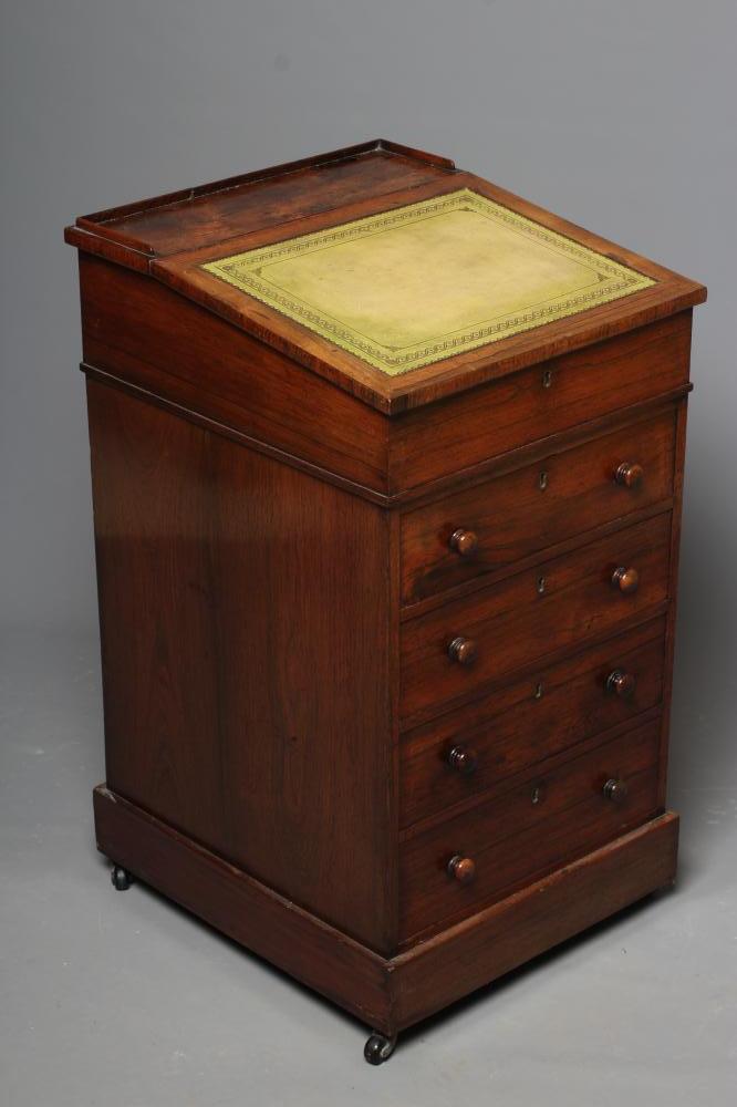 A ROSEWOOD SWIVEL TOP DAVENPORT Image