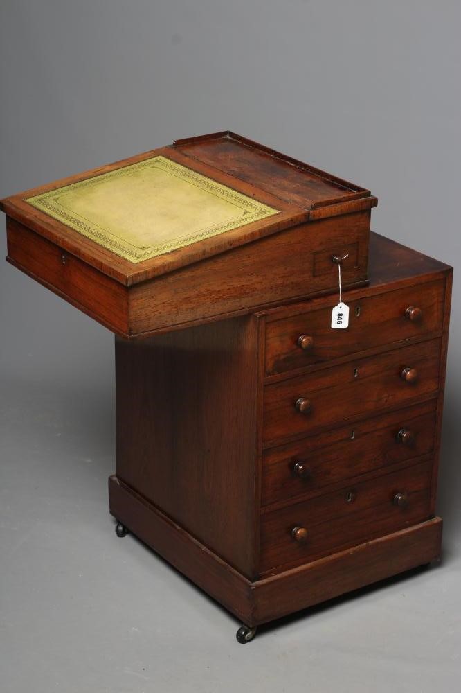 A ROSEWOOD SWIVEL TOP DAVENPORT Image