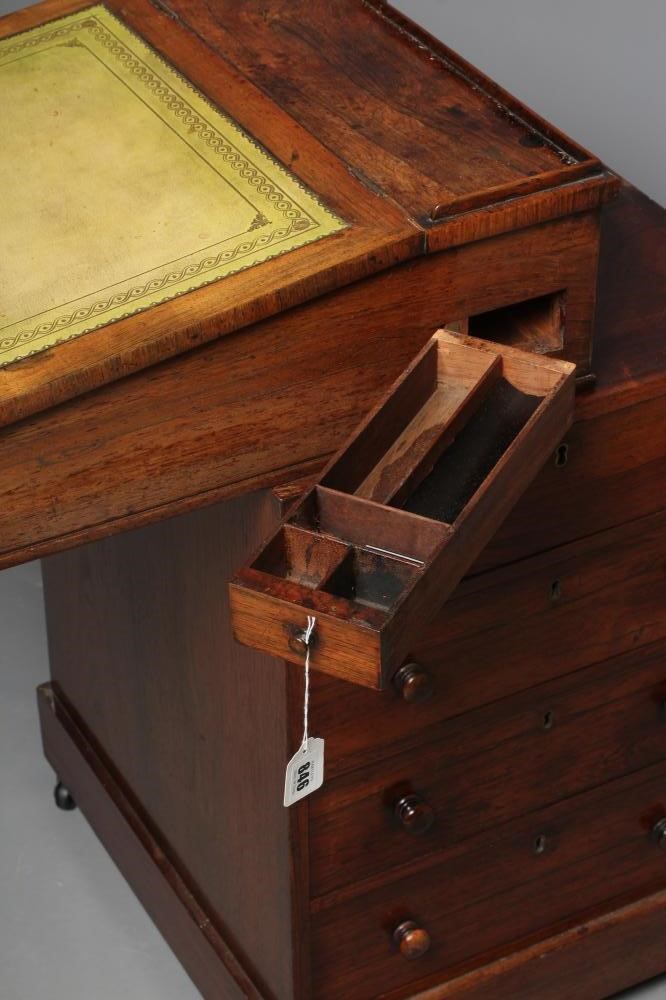 A ROSEWOOD SWIVEL TOP DAVENPORT Image