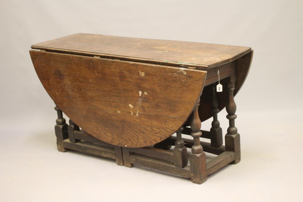 A WILLIAM & MARY LARGE OAK GATELEG TABLE Image