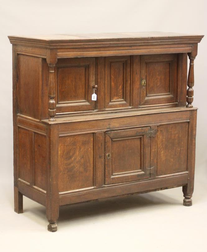 A JOINED OAK PRESS CUPBOARD Image
