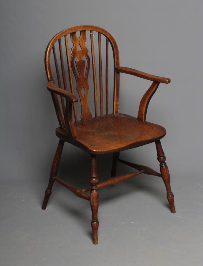 A LATE VICTORIAN ASH AND ELM WINDSOR ARMCHAIR Image