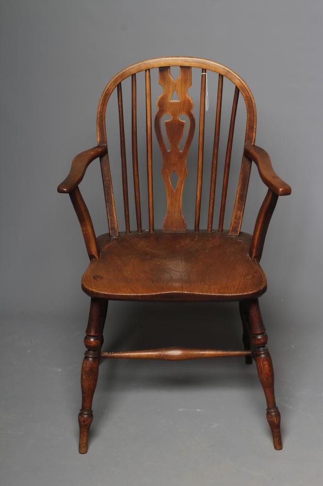 A LATE VICTORIAN ASH AND ELM WINDSOR ARMCHAIR Image
