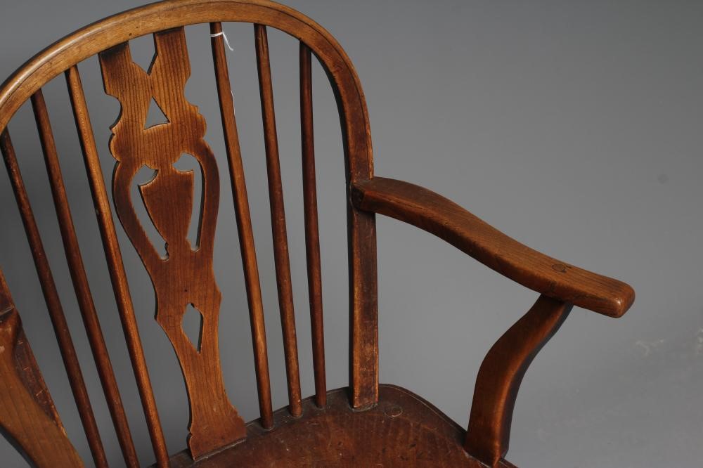A LATE VICTORIAN ASH AND ELM WINDSOR ARMCHAIR Image