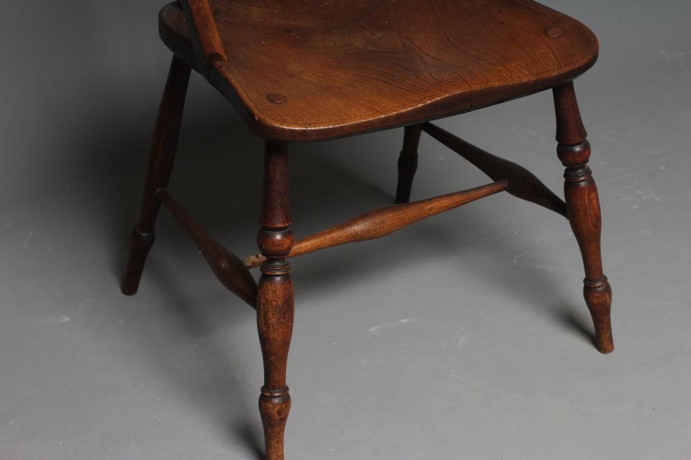 A LATE VICTORIAN ASH AND ELM WINDSOR ARMCHAIR Image