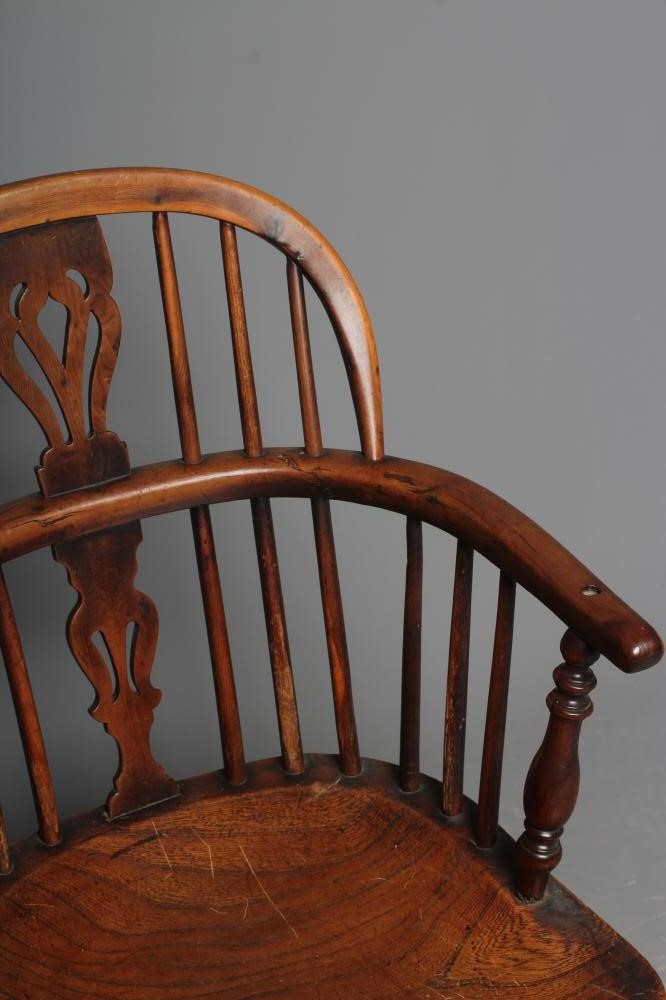 A VICTORIAN YEW WOOD WINDSOR ARMCHAIR Image