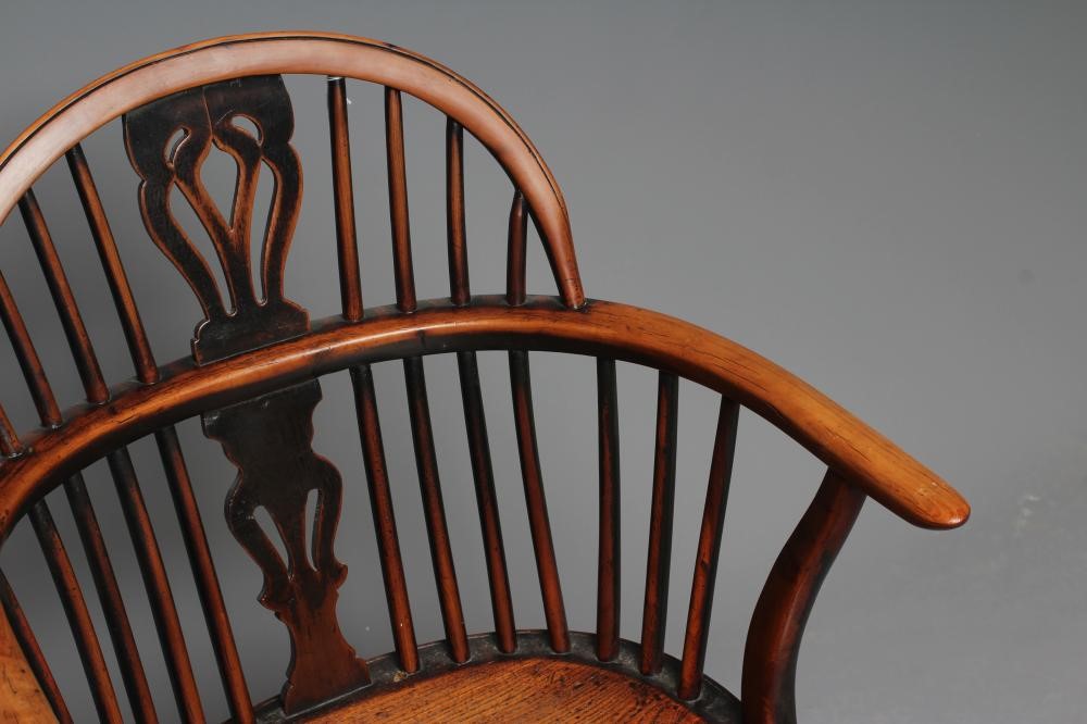 A YEW WOOD WINDSOR ARMCHAIR Image