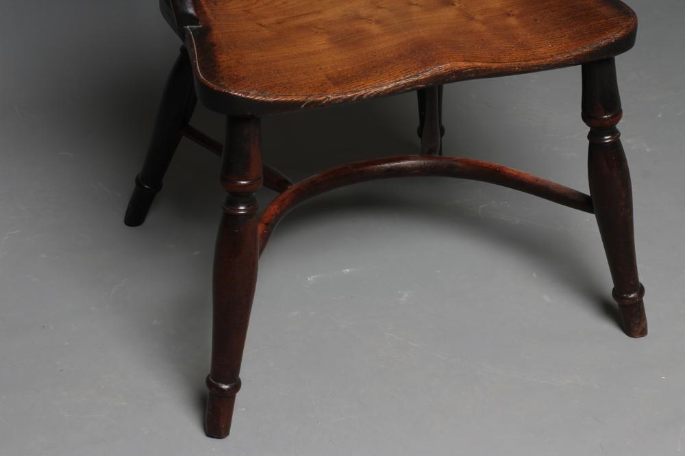 A YEW WOOD WINDSOR ARMCHAIR Image