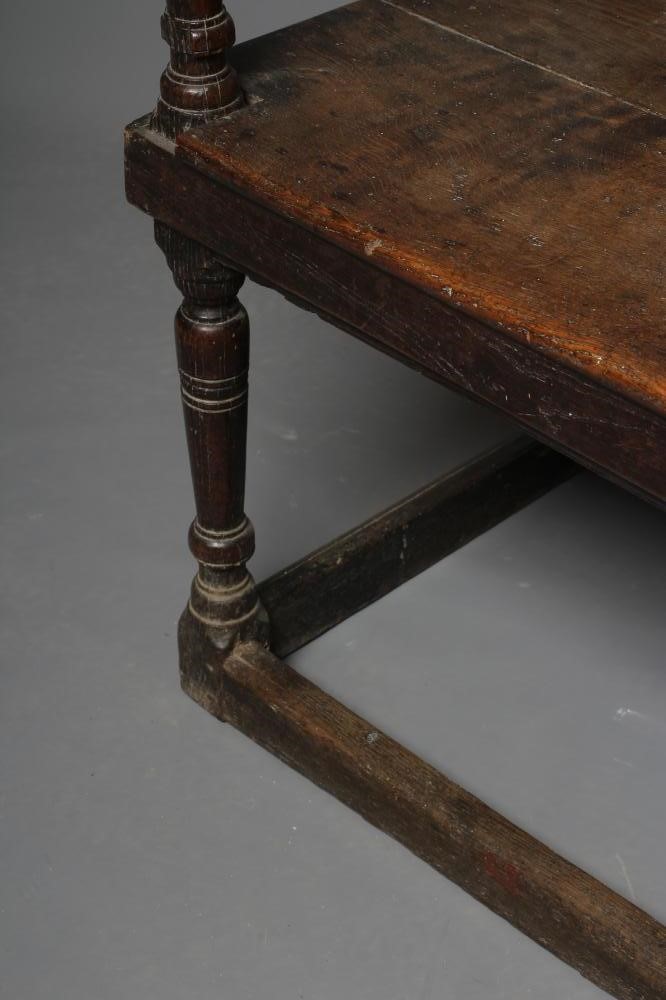 A LARGE JOINED OAK ARMCHAIR Image