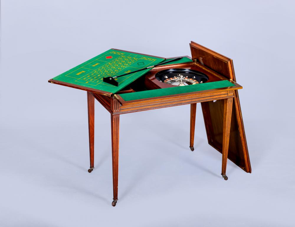 A MAHOGANY ROULETTE/CARD TABLE Image