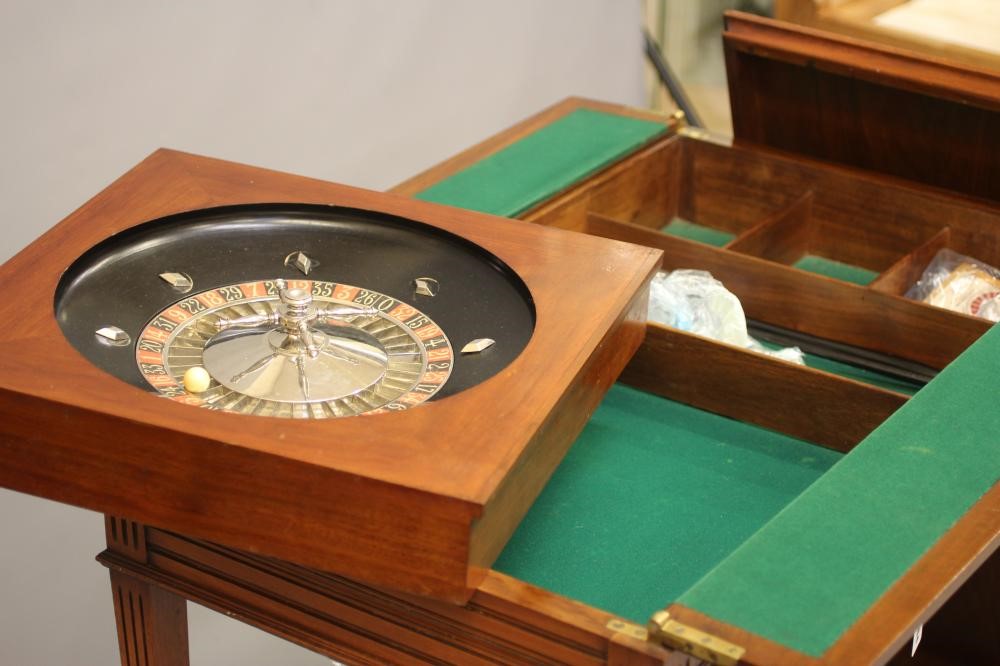 A MAHOGANY ROULETTE/CARD TABLE Image