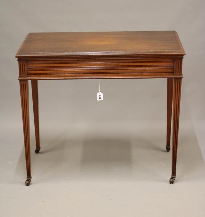 A MAHOGANY ROULETTE/CARD TABLE Image