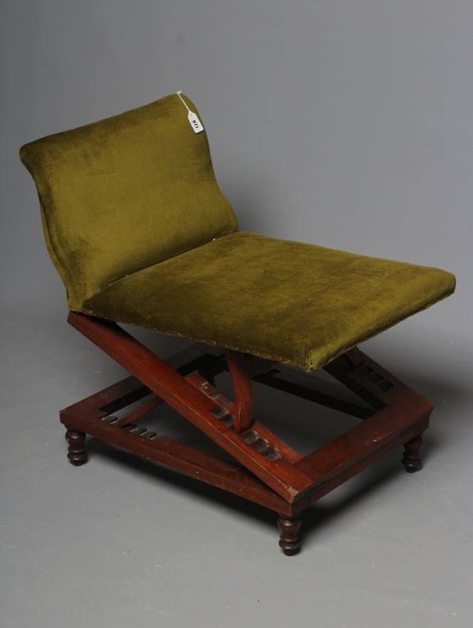 A VICTORIAN MAHOGANY GOUT STOOL, third quarter 19th century, the green dralon upholstered rest above Image