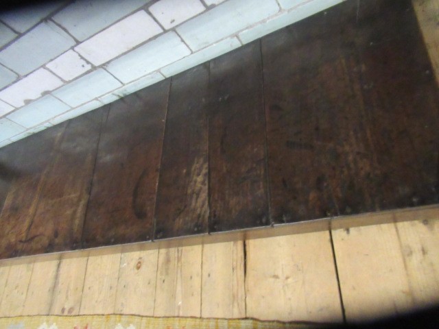 A GEORGIAN OAK POTBOARD DRESSER, early 19th century, the single plank top over three moulded edged Image