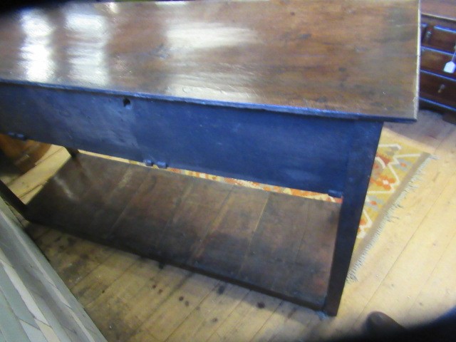A GEORGIAN OAK POTBOARD DRESSER, early 19th century, the single plank top over three moulded edged Image