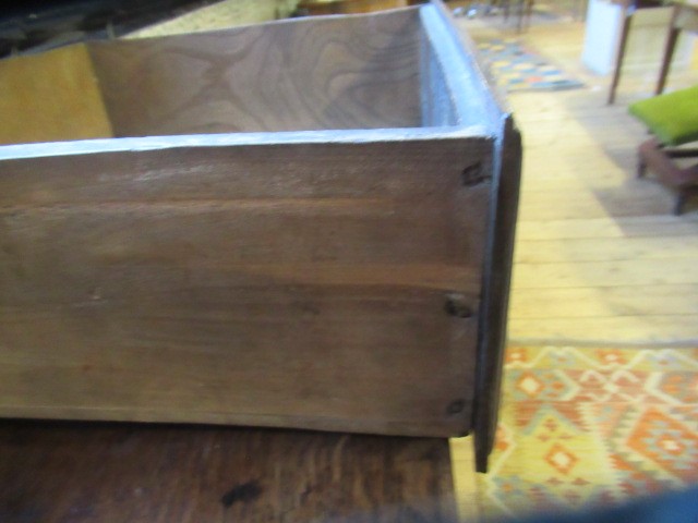 A GEORGIAN OAK POTBOARD DRESSER, early 19th century, the single plank top over three moulded edged Image