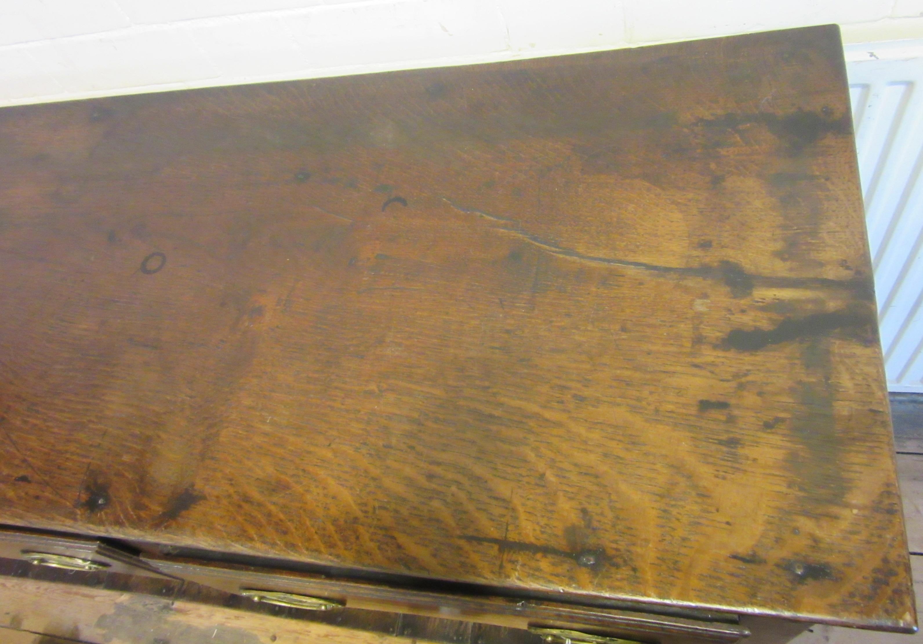 A GEORGIAN OAK POTBOARD DRESSER, early 19th century, the single plank top over three moulded edged Image