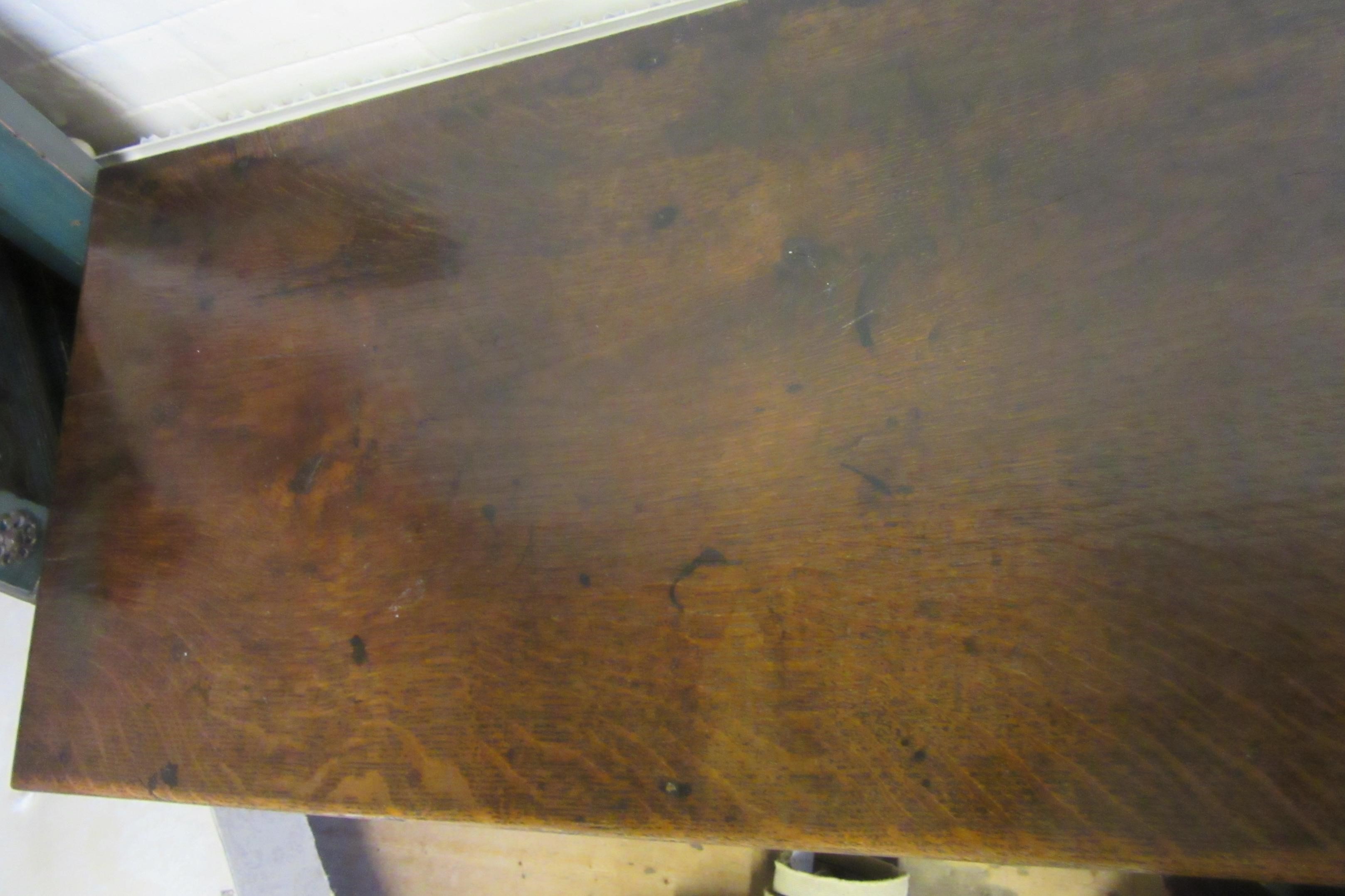 A GEORGIAN OAK POTBOARD DRESSER, early 19th century, the single plank top over three moulded edged Image