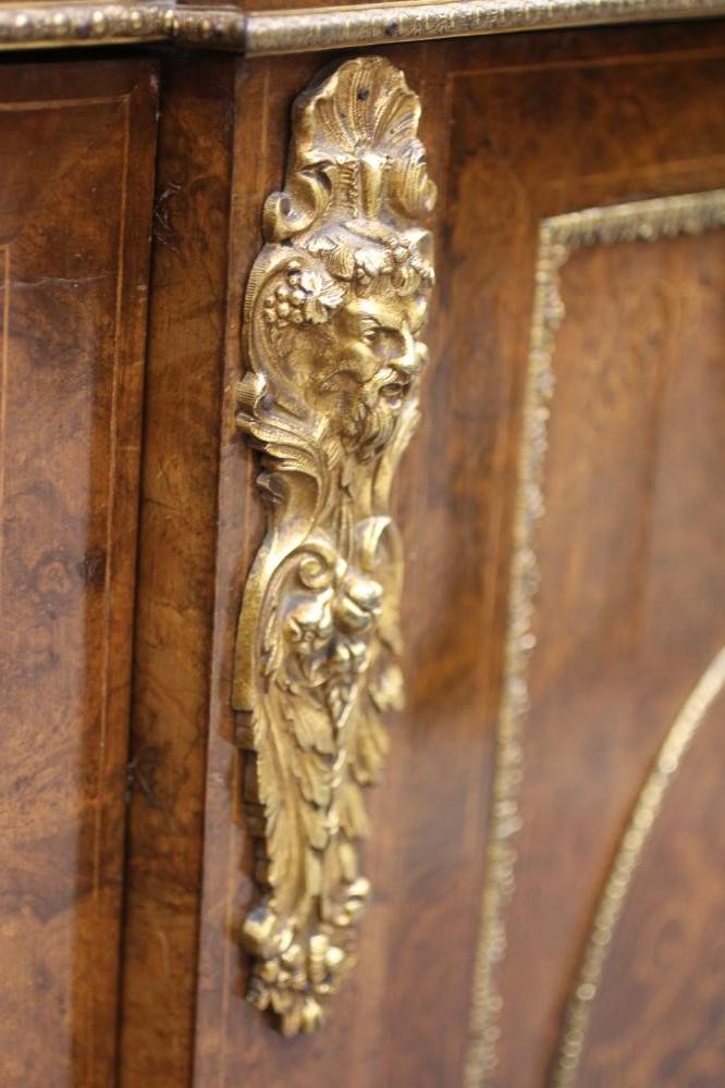 A VICTORIAN BURR WALNUT AND MARQUETRY CREDENZA Image
