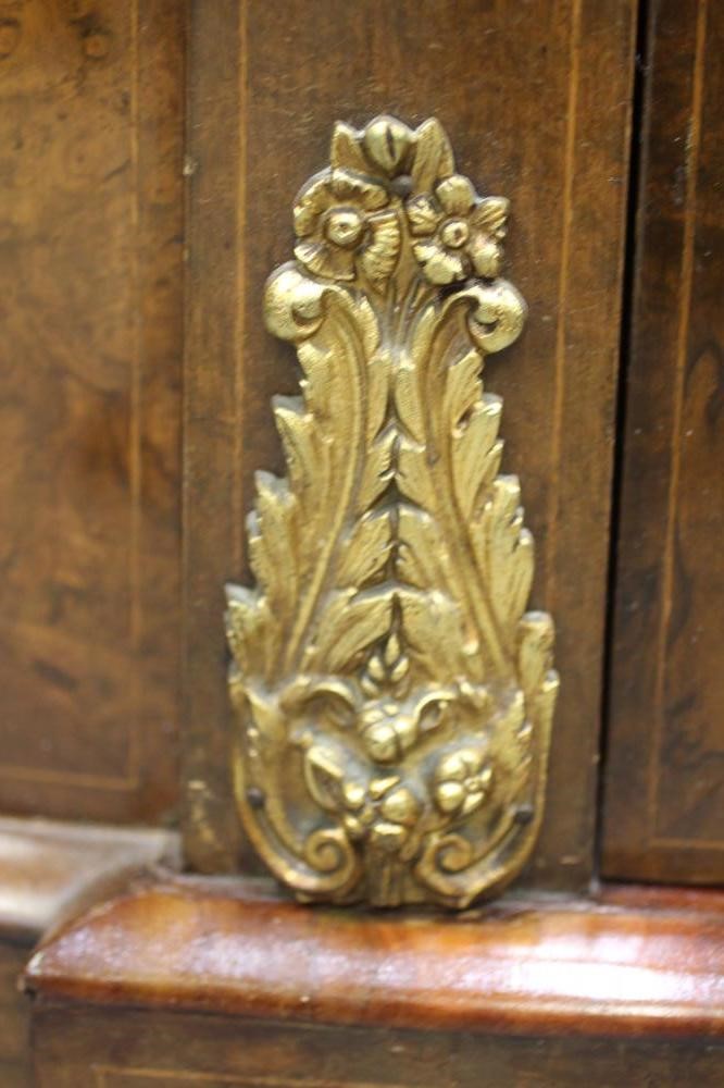 A VICTORIAN BURR WALNUT AND MARQUETRY CREDENZA Image
