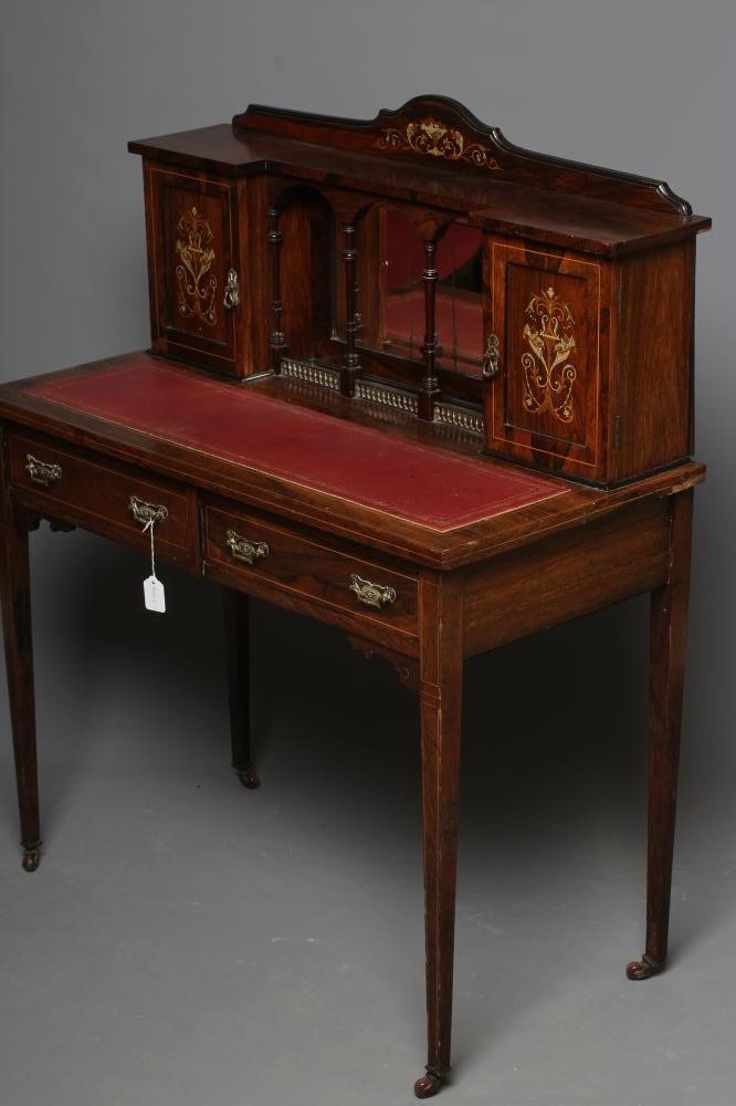 AN EDWARDIAN ROSEWOOD AND MARQUETRY BONHEUR DU JOUR Image