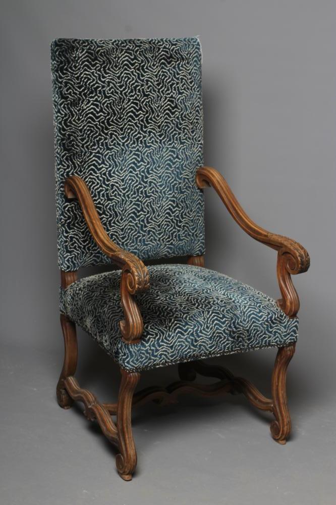 A CARVED WALNUT ARMCHAIR Image