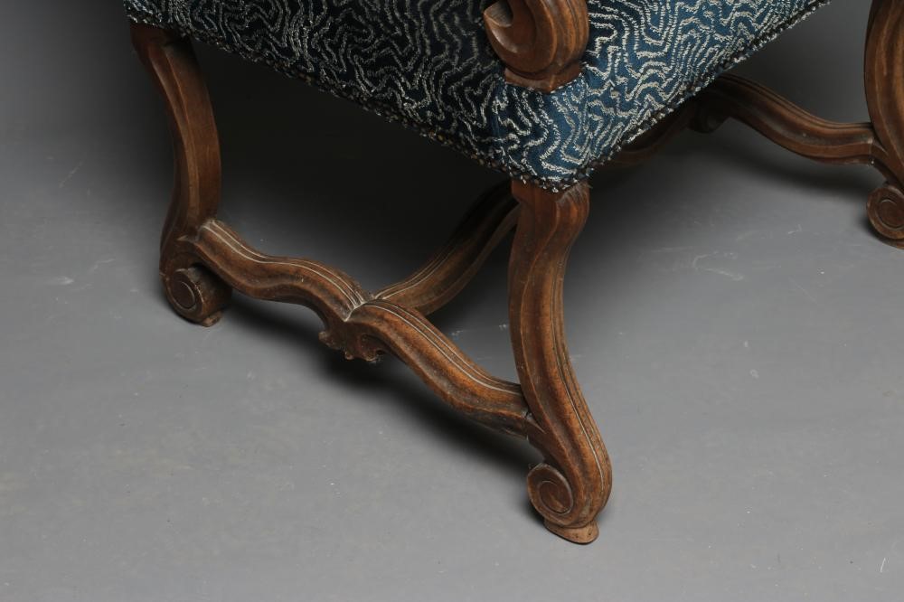 A CARVED WALNUT ARMCHAIR Image